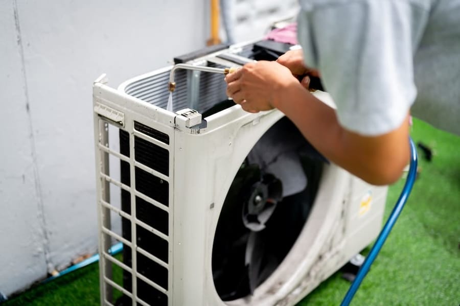 Technician working on HVAC