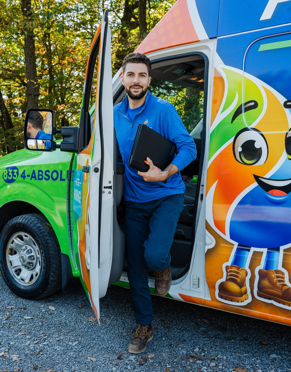 HVAC technician coming out of van.