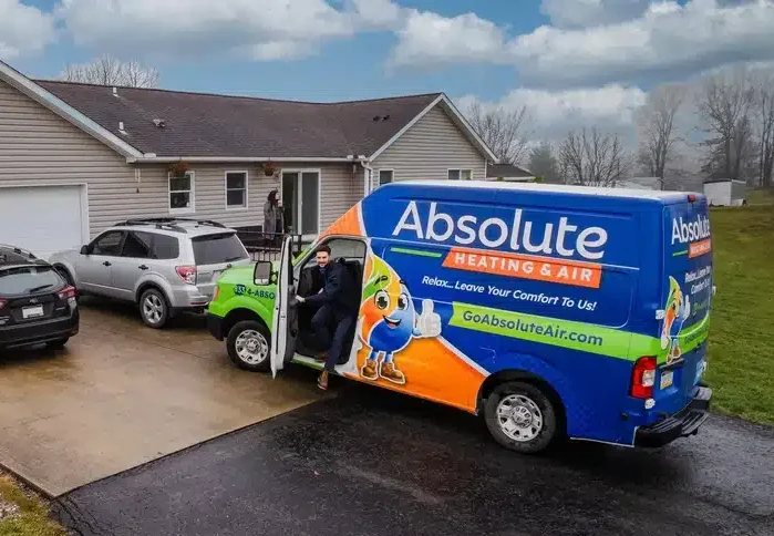 Absolute Heating & Air truck with tech ready to service home
