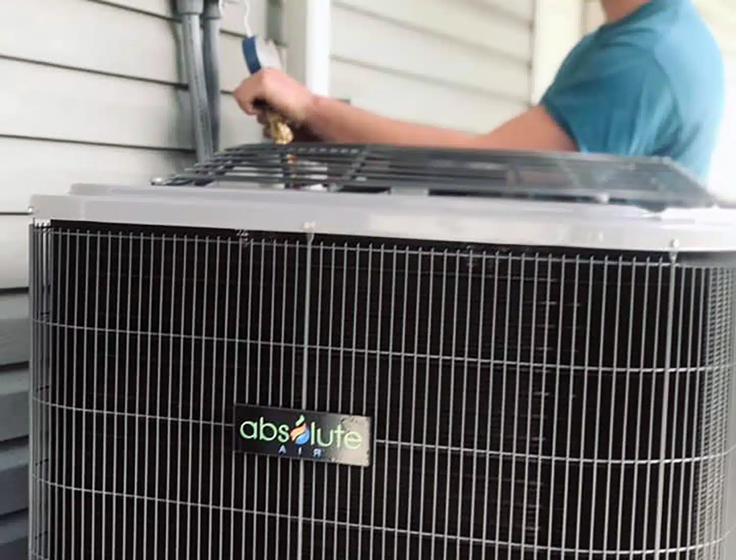 Absolute Heating & Air heat pump service outside of home in Morgantown, WV